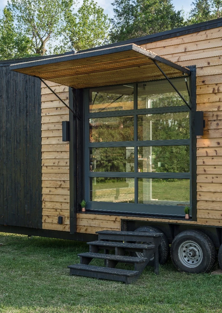 The Escher has a neat garage-style door that raises to open the home to the outside