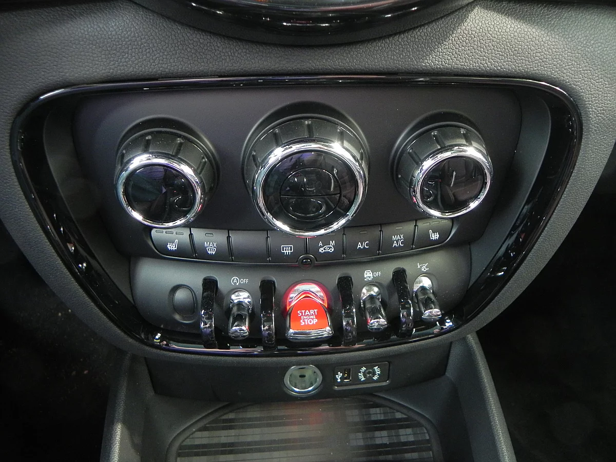 The Mini's signature aircraft-style toggle switches are found throughout the cabin