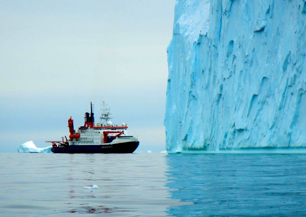 The RV Polarstern alongside a massive glacier, off the coast of West Antarctica