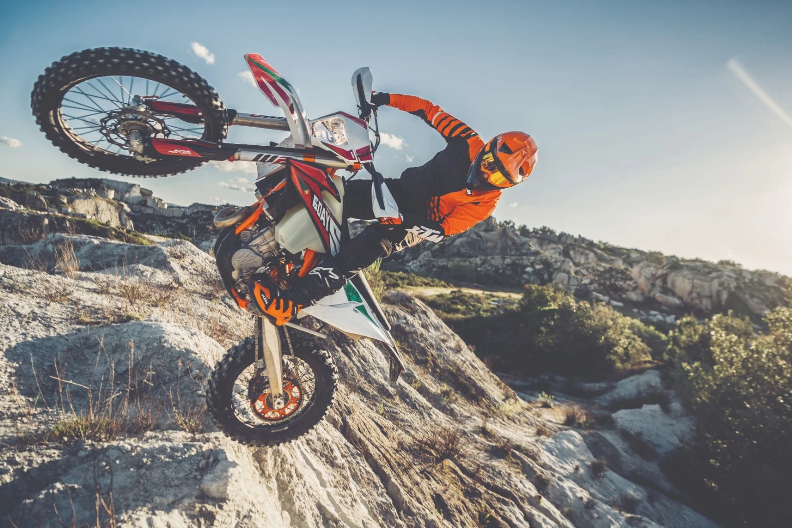 The 2020 KTM 450 EXC-F (Six Days edition) at an improbable angle. If you or I found ourselves at this angle, hospital would soon follow