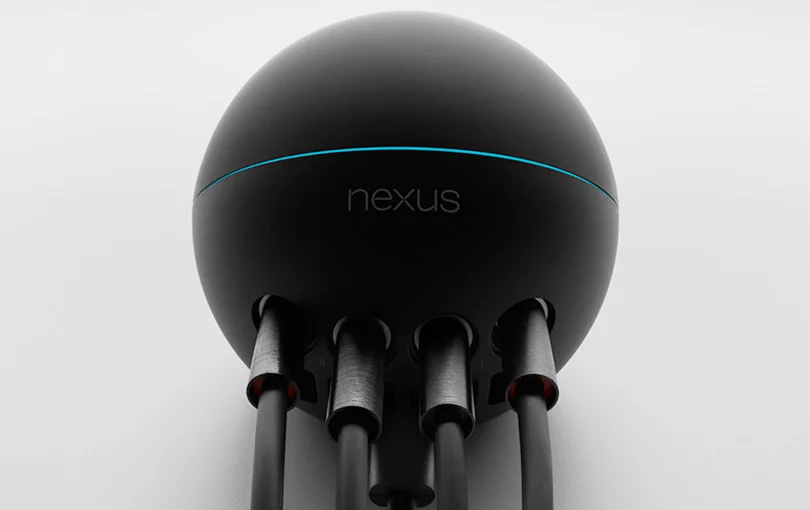 The Nexus Q hooked up to a couple of speakers