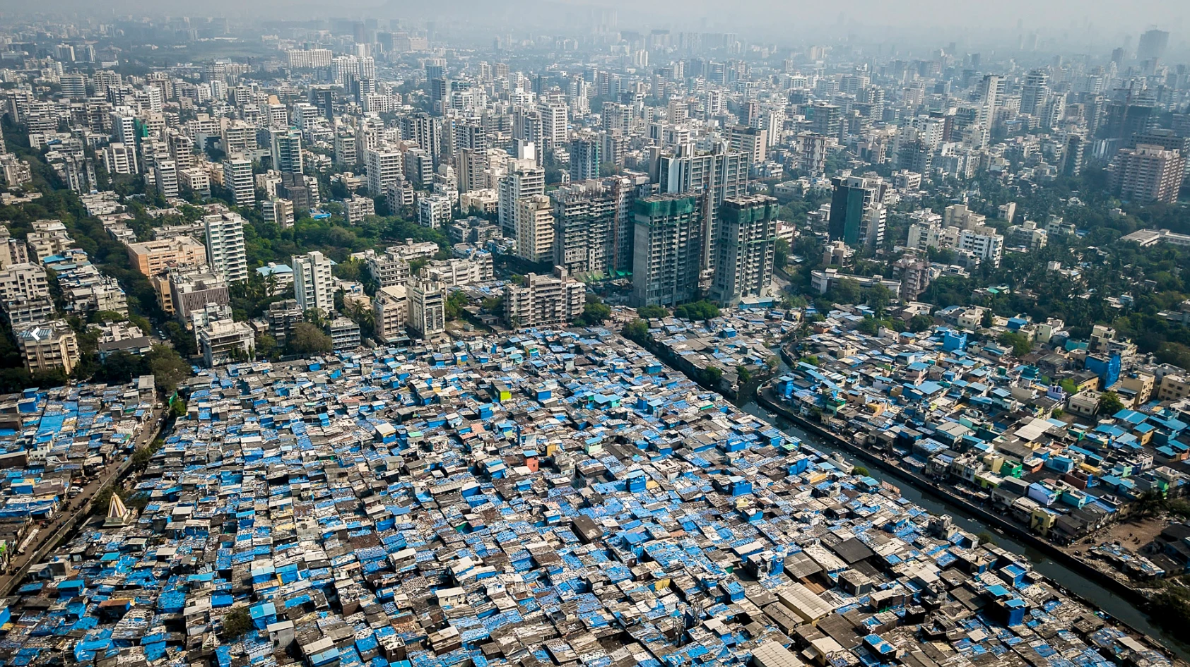 Downtown Mumbai, with slums in the foreground