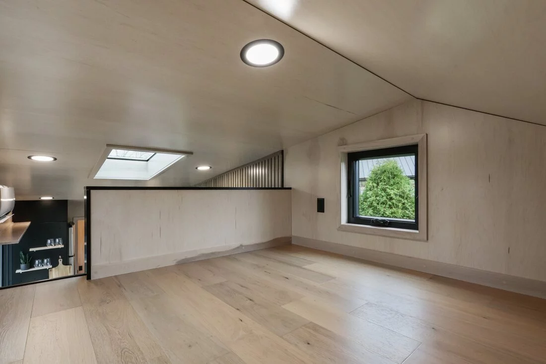 The Sangja's secondary bedroom is upstairs and has a low ceiling and space for a double bed