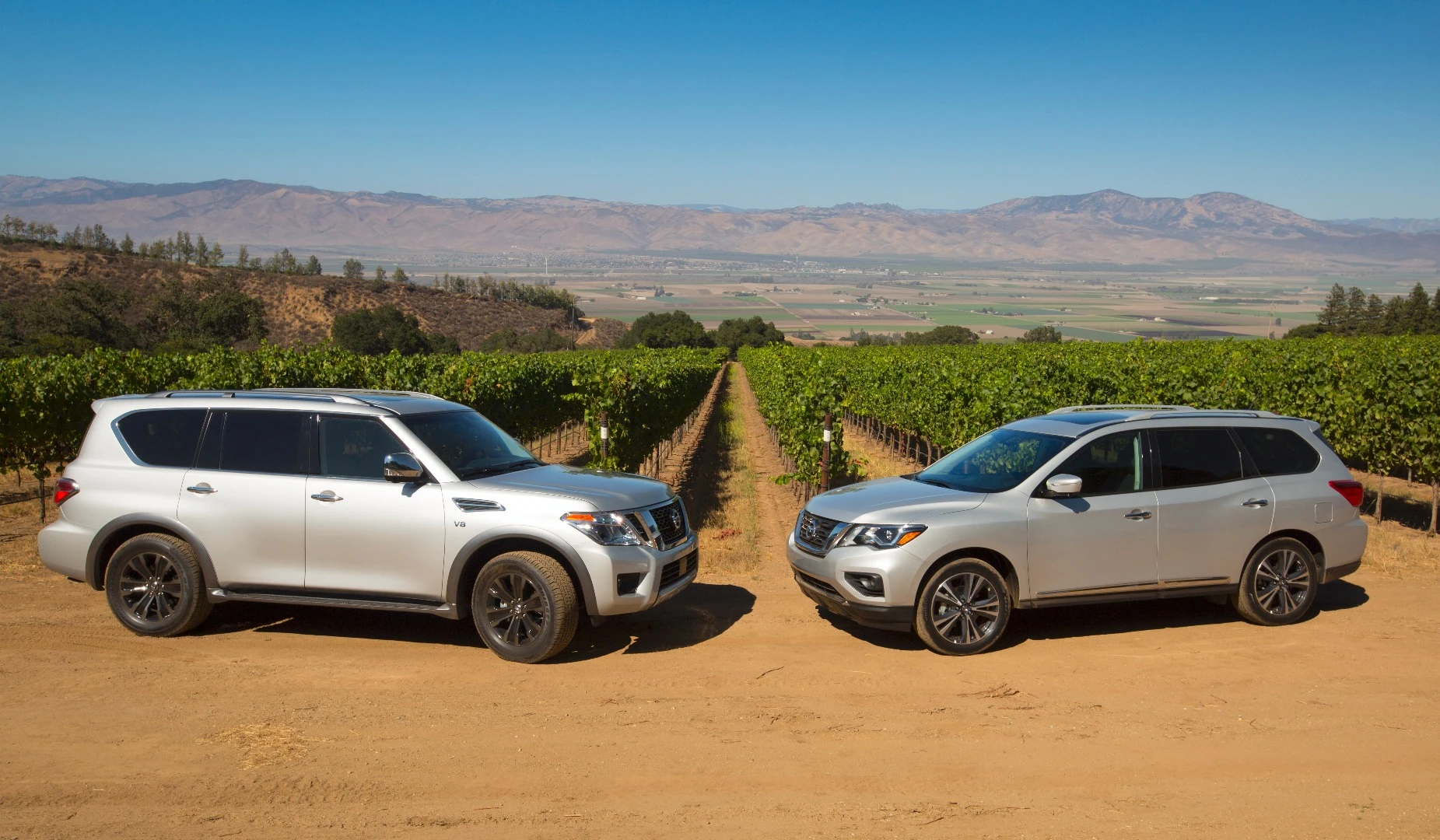 The Pathfinder sits just below the larger Armada (left) in Nissan's SUV lineup