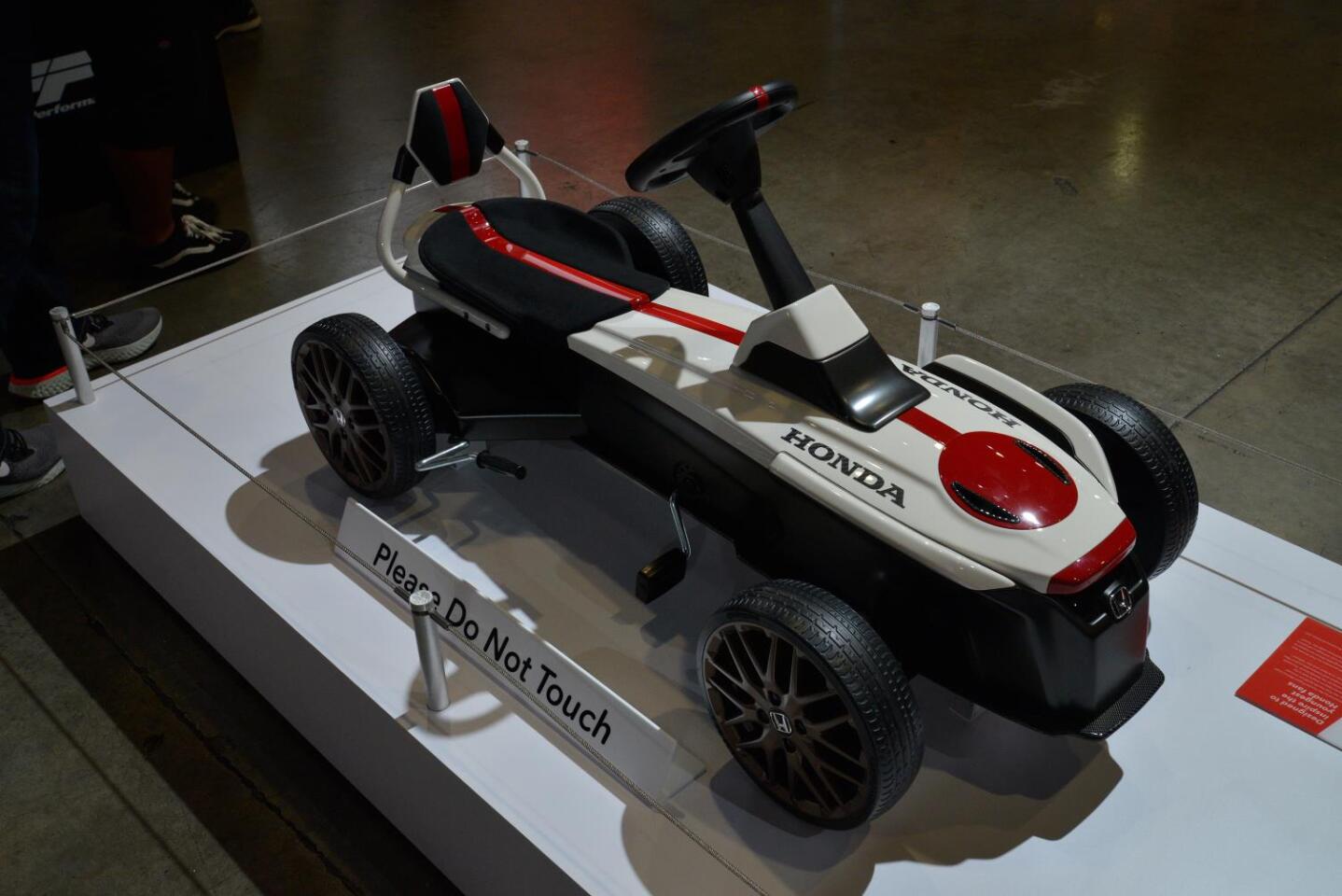 It may not be the most powerful car in Honda's SEMA lineup, but this First Honda pedal car concept is still one of the coolest; inspired by the 2015 2&4 Concept, it's designed to get kids excited about the Honda brand