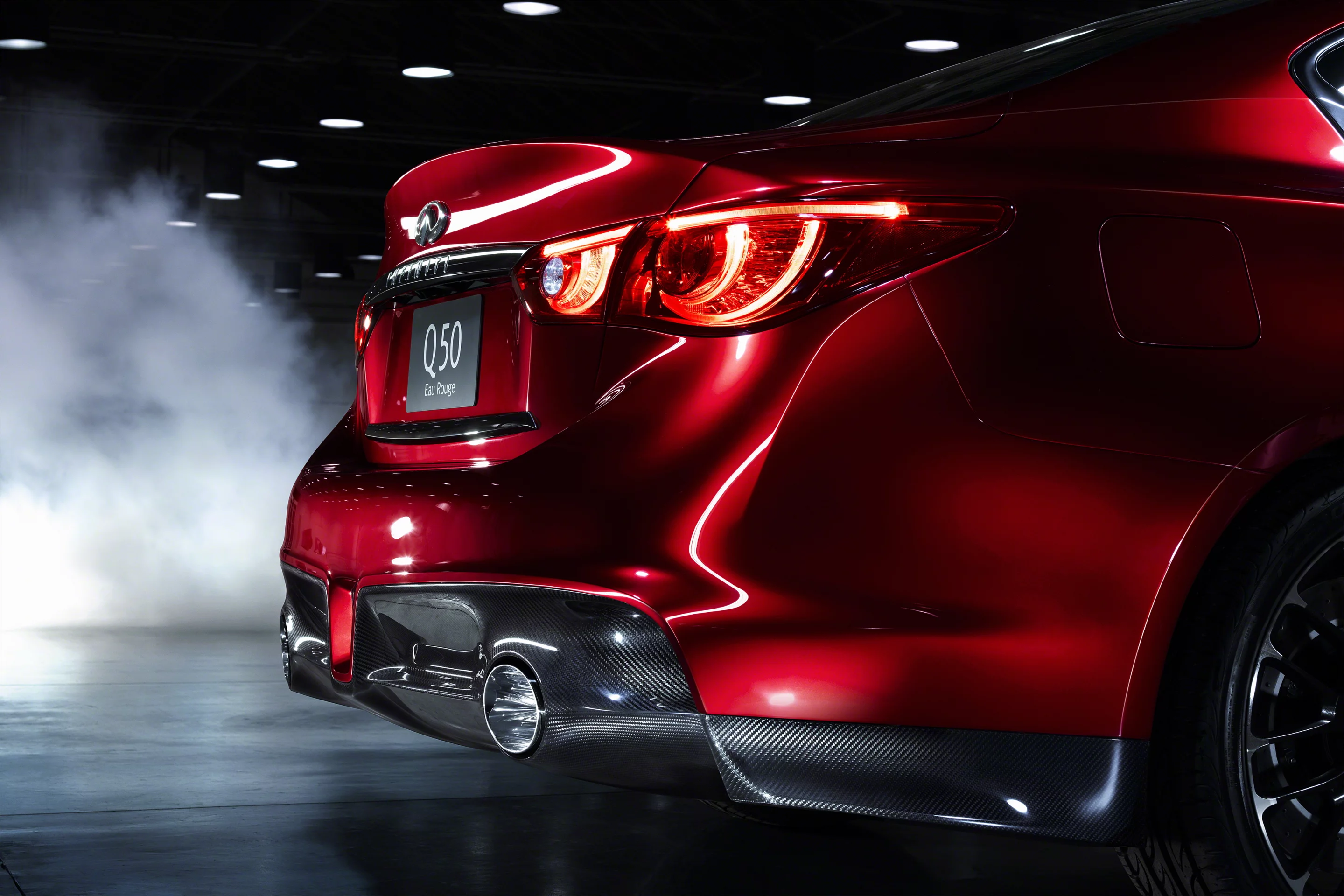 Further emphasizing the car’s serious nature out back, beneath the big deck lid spoiler resides the car’s carbon fiber diffuser with oversized exhaust pipes