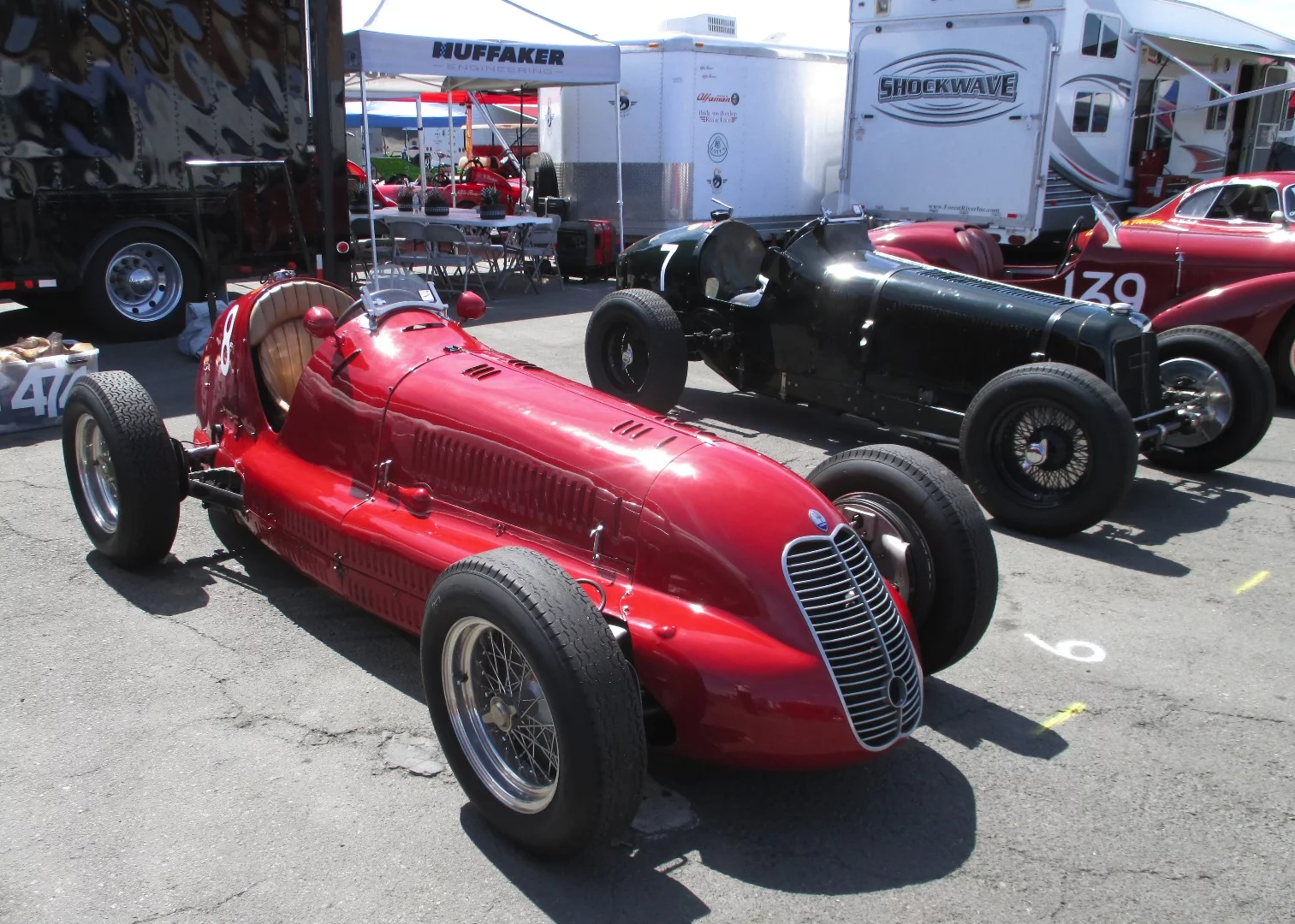 Open wheel racers in the pits at the Monterey Historics
