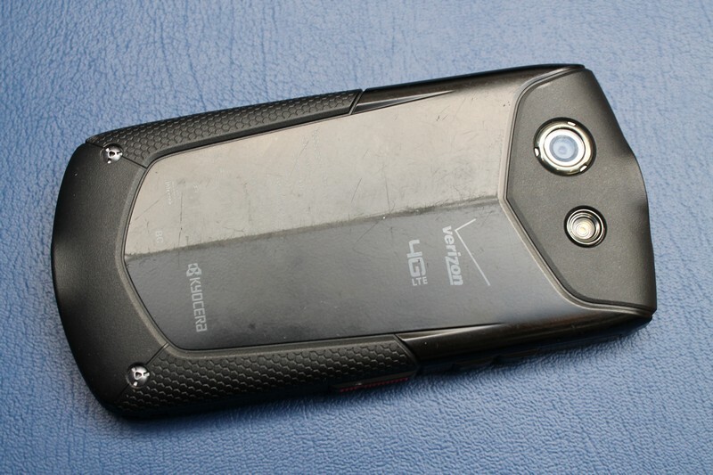 The sapphire screen remains pristine, but the rear panel reveals weaks of rough treatment