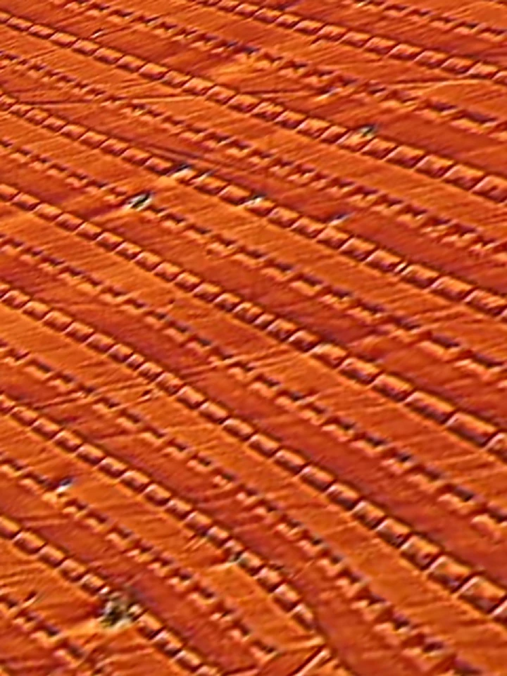 A microscopic view of periodic magnetic cells created in iron-gallium alloy that appear to be responsible for the strange non-Joulian magnetostriction