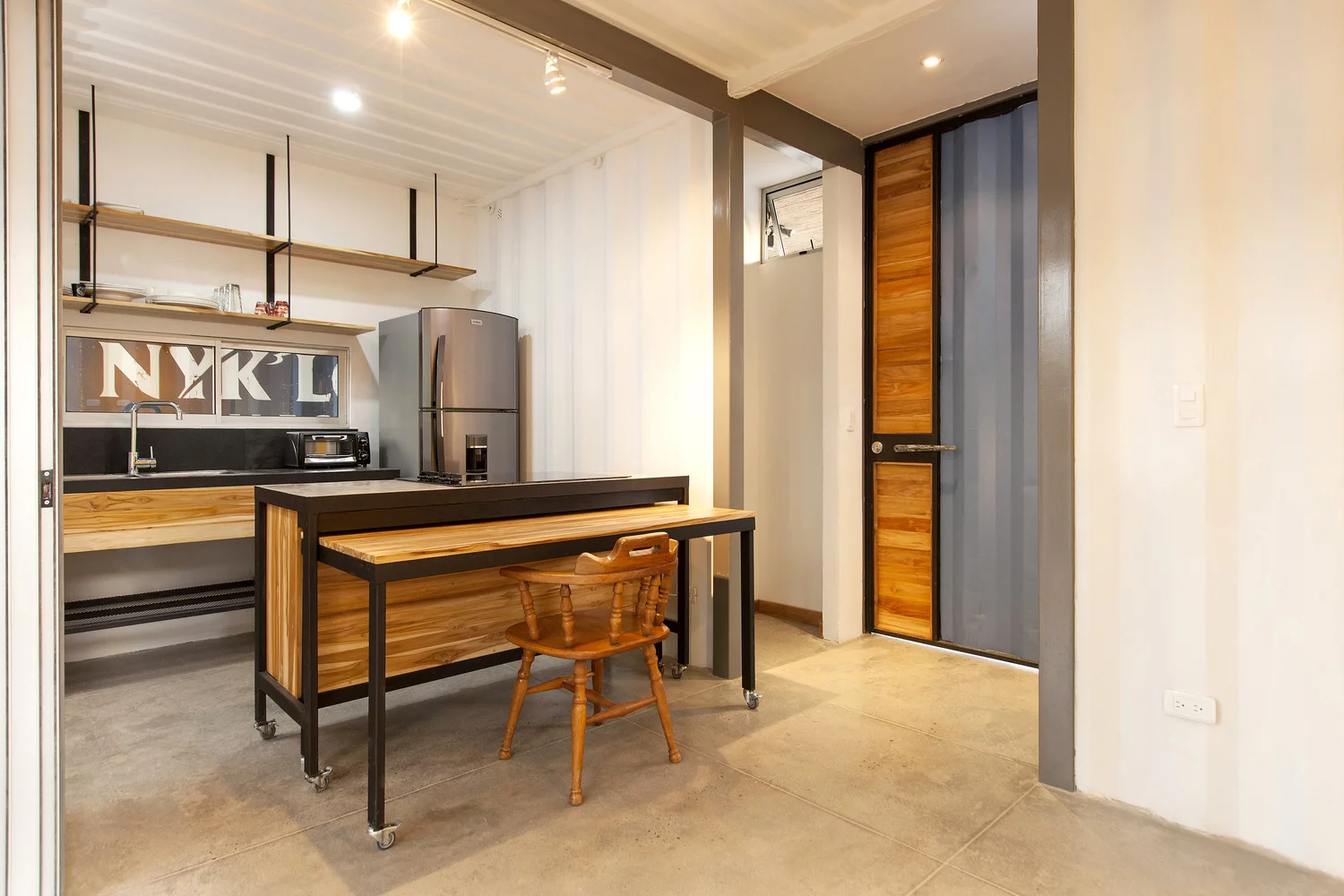 The Contenedores Franceschi homes feature furniture made from scrap materials