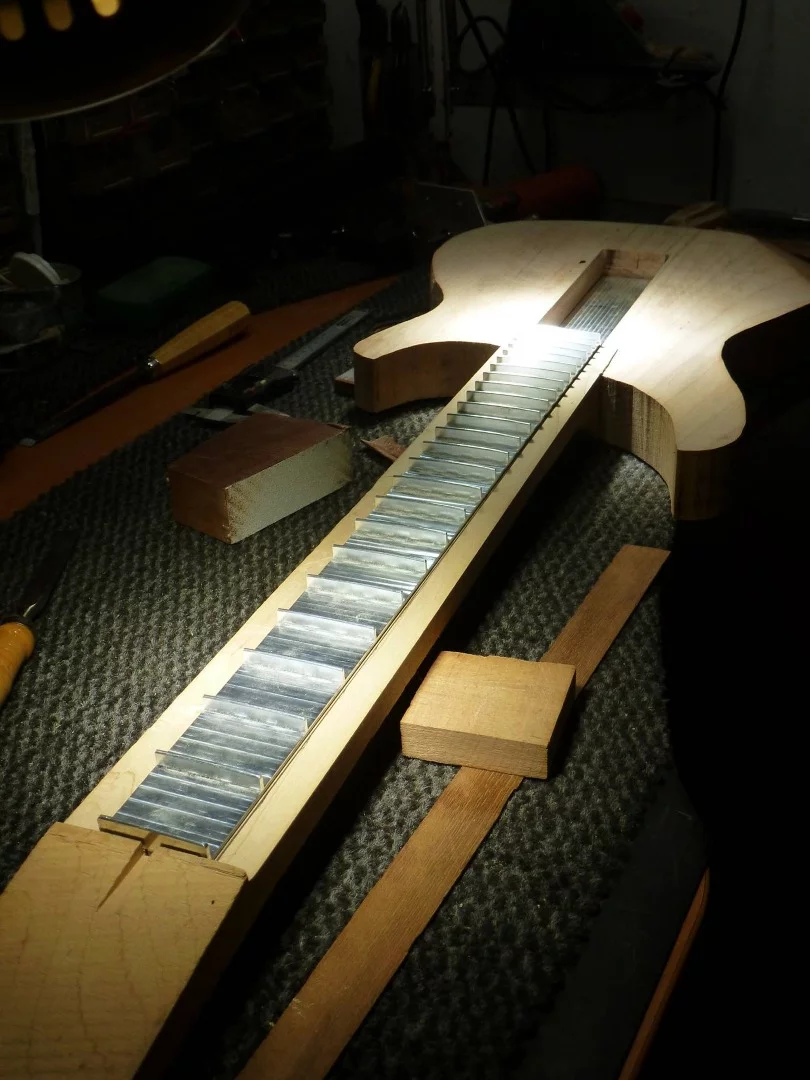 The Subfretboard's designers say that any metal can be used for the system, but selected aluminum alloy for the prototype