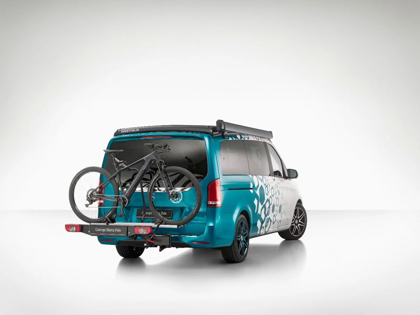 Mercedes' press release doesn't discuss it, but it appears the Concept Marco Polo also has a remote controlled swing-away hitch rack