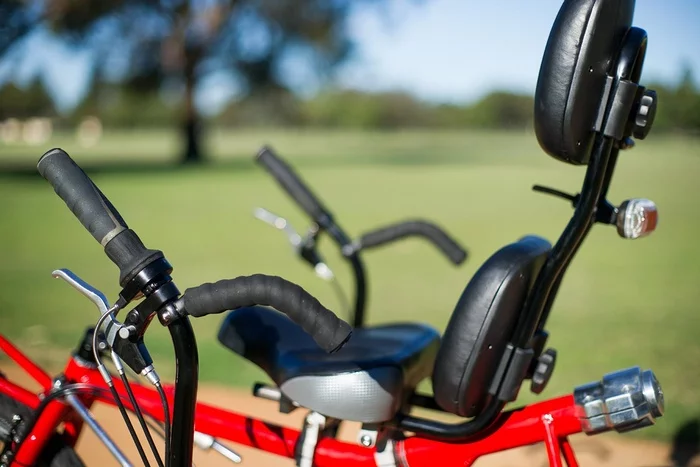 Hand controls on the Trivek's under-seat handlebar allow riders to adjust the damping of the steering system as they're riding