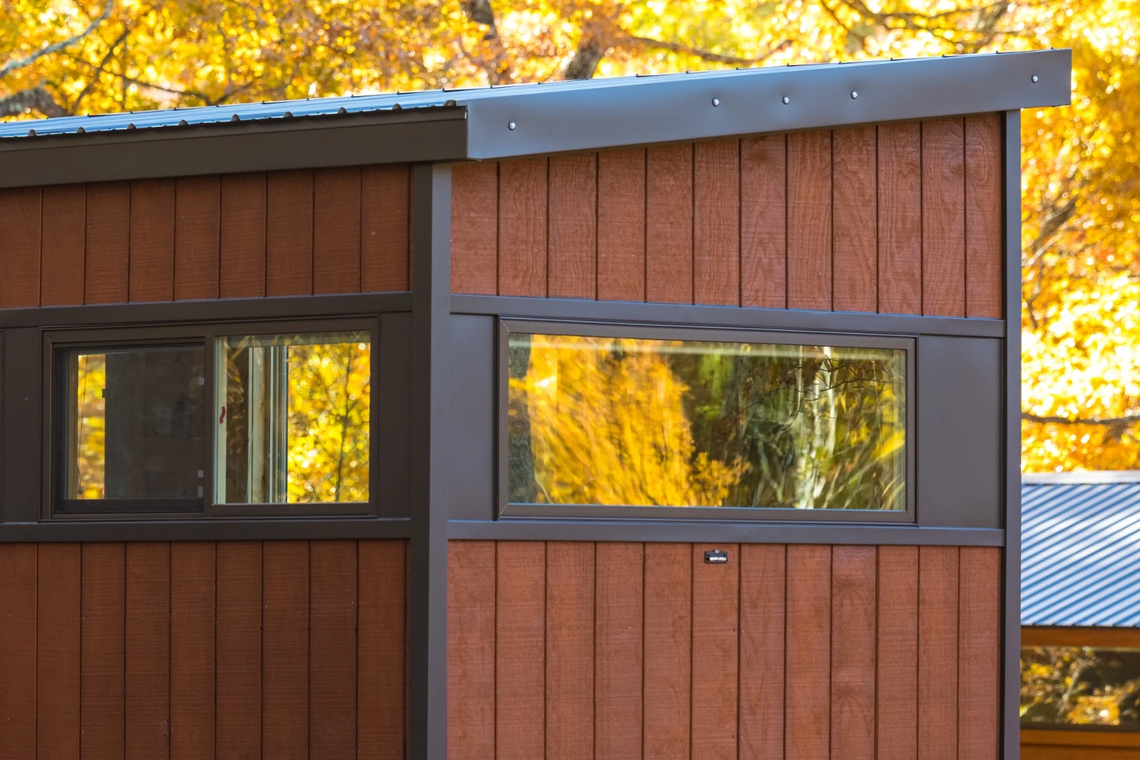 The Vista Boho is finished in rough sawn wood siding as standard, with cedar an optional upgrade
