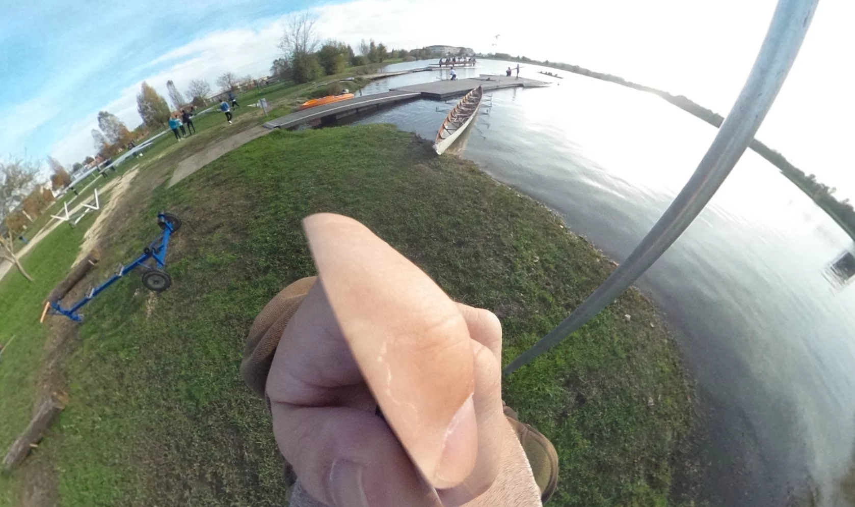 Firing the shutter while holding the camera does result in a disfigured hand appearing at the bottom of the frame