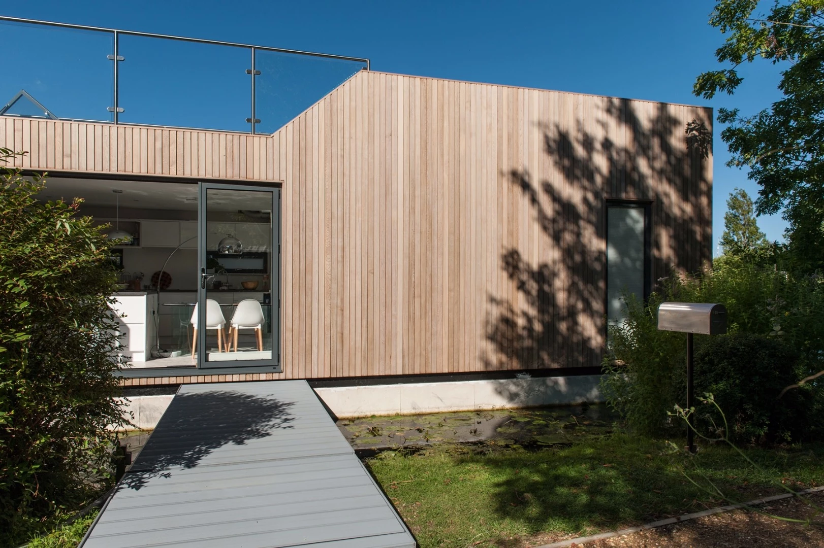 The Chichester floating home has full height windows in places to make the most of surrounding views