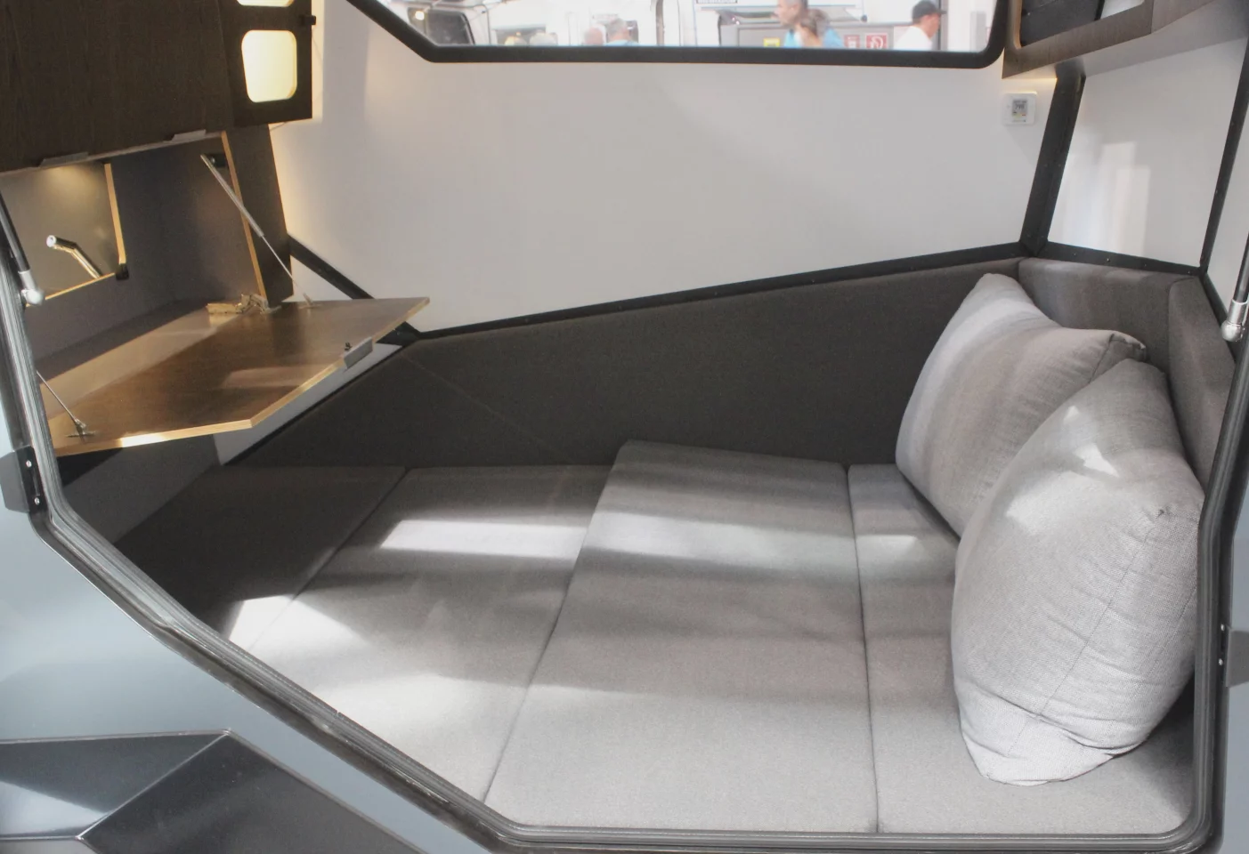 The fold-down pass-through hatch doubles as a table/desk