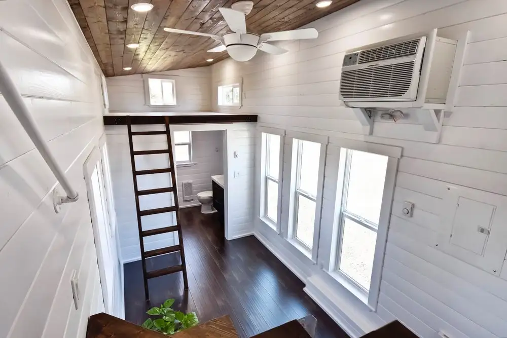 The ladder offers access to the secondary sleeping loft