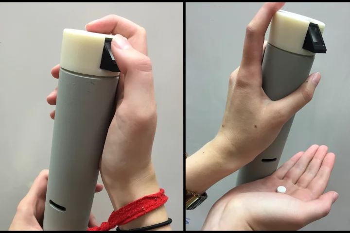 The fingerprint-reading pill dispenser in use