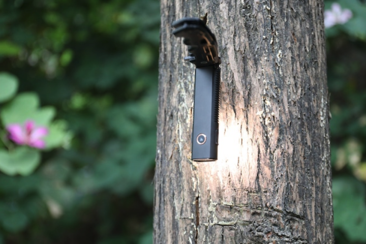The Trustfire Mini X3's magnetic base makes it a functional work light or overhead camping lamp