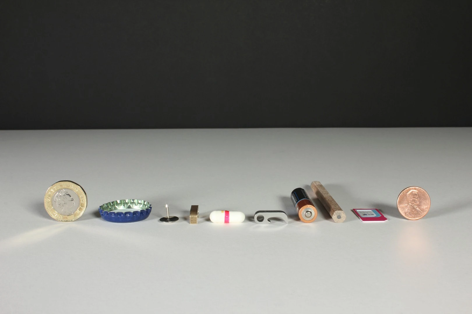 Malboro & Kane’s tiny Claw multitool next to a bunch of small things