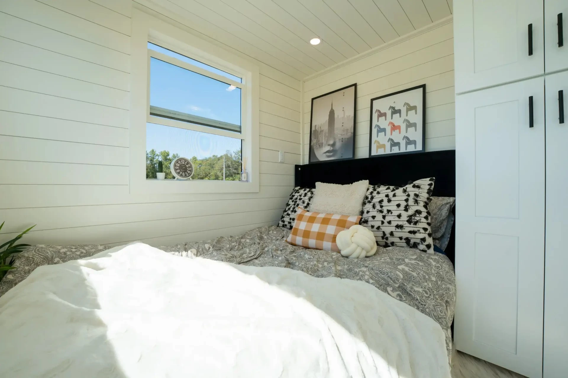 The Webster's downstairs bedroom includes a double bed with integrated storage, plus a closet