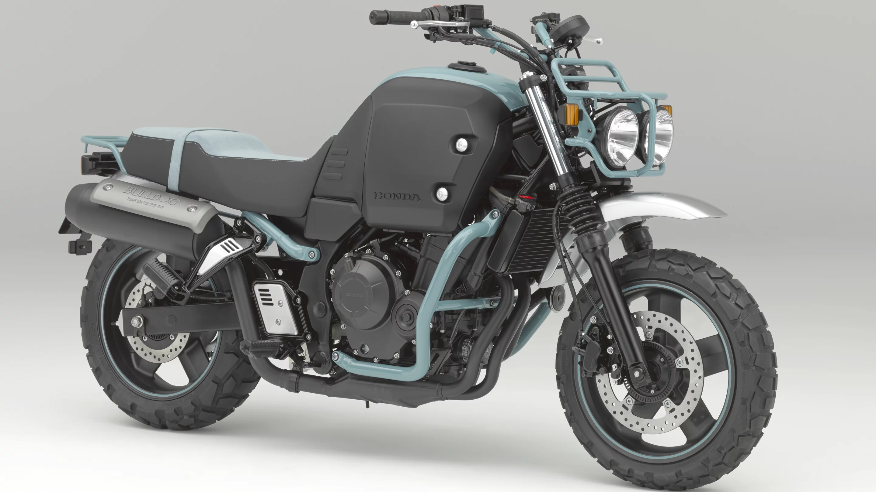 Honda's 47 hp, 400 cc twin-cylinder powerplant is the engine used in the Bulldog, and it was designed as a flexible motor with useful power throughout the rev spectrum