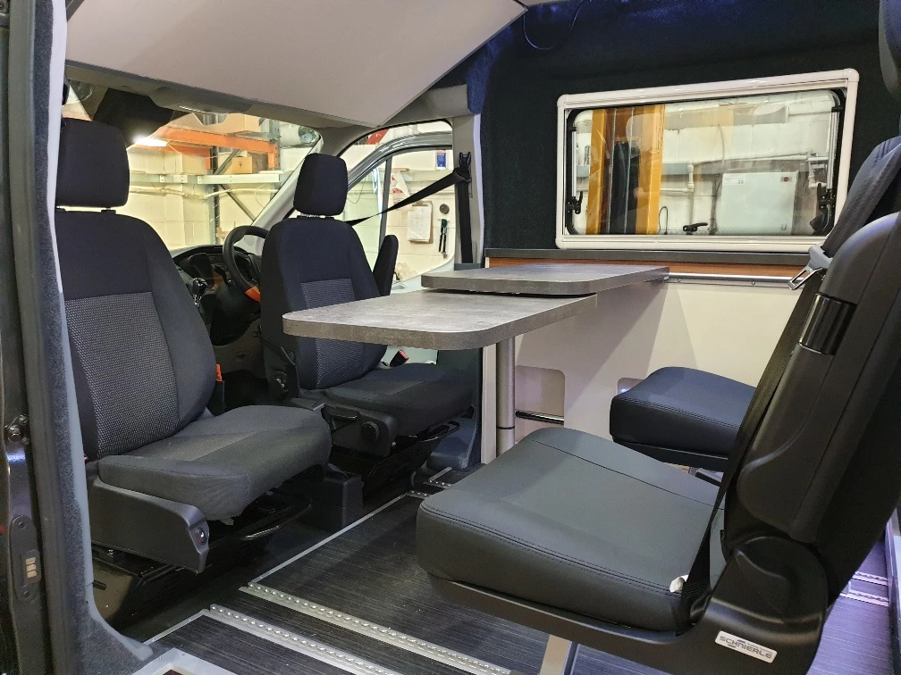 The Transit Giant lounge definitely looks more comfortable and practical than the usual cramped dual-seat bench front lounge