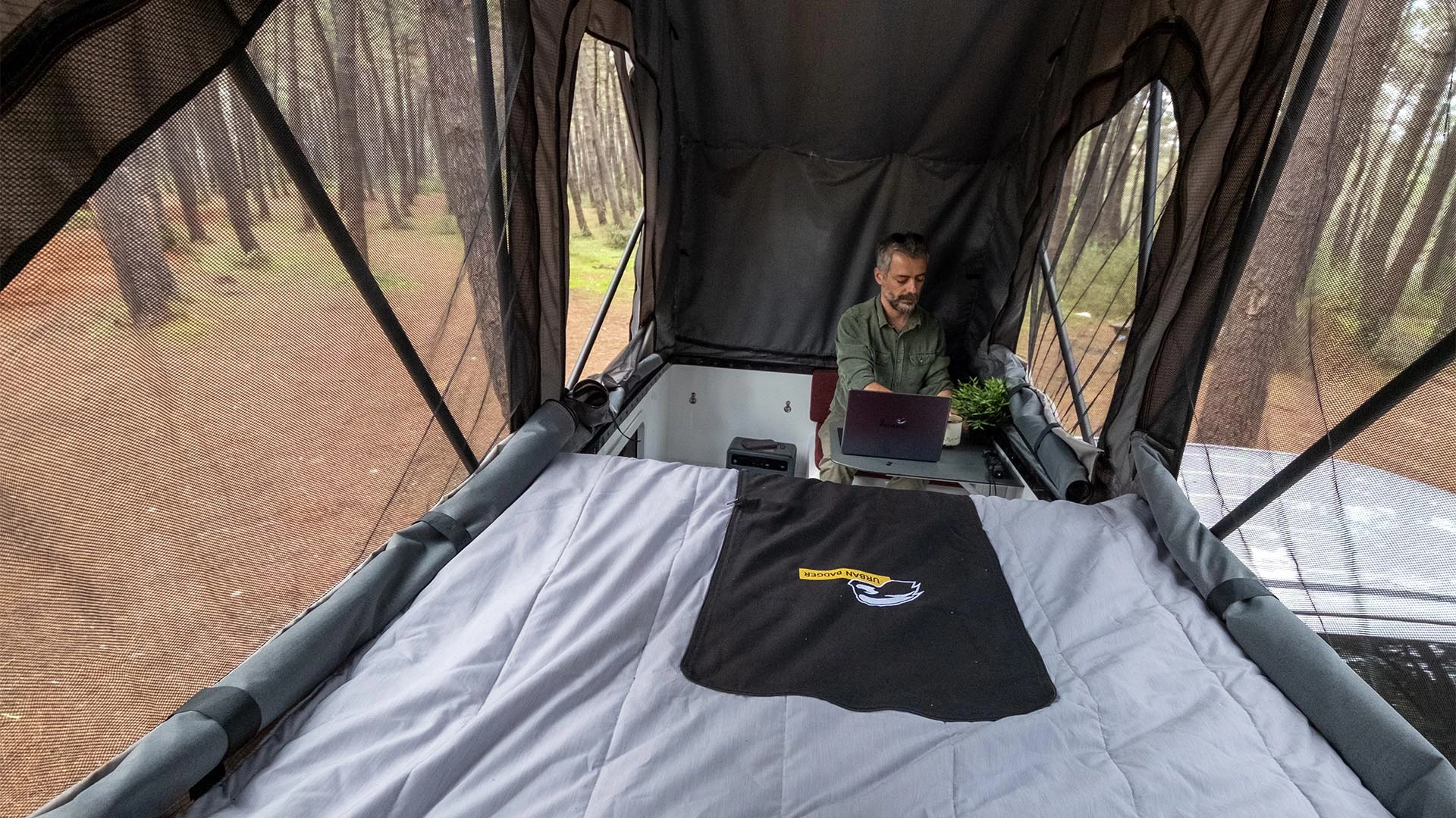 The dinette doubles as a workstation for digital nomads telecommuting from the wild