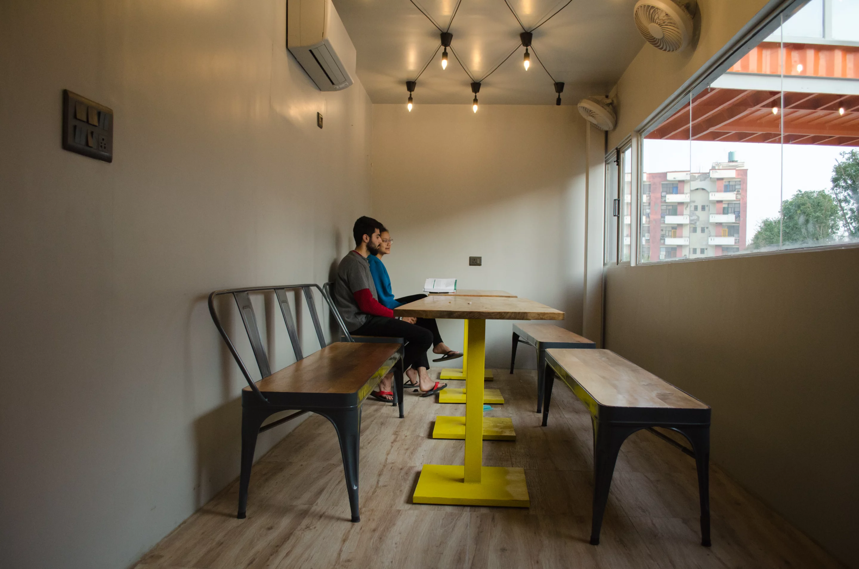 Café Infinity's interior also includes air-conditioning units and fans