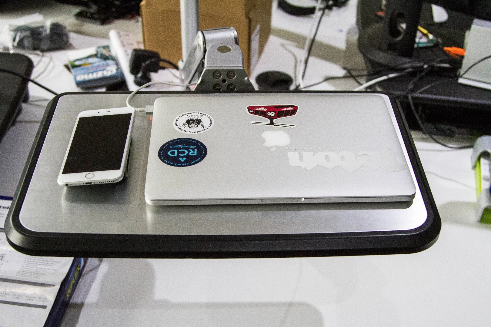 There's room for a 13-inch laptop and an iPhone 6S on the stand
