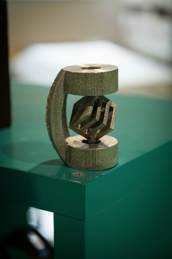 Sample parts cast using a sand-printed mold.