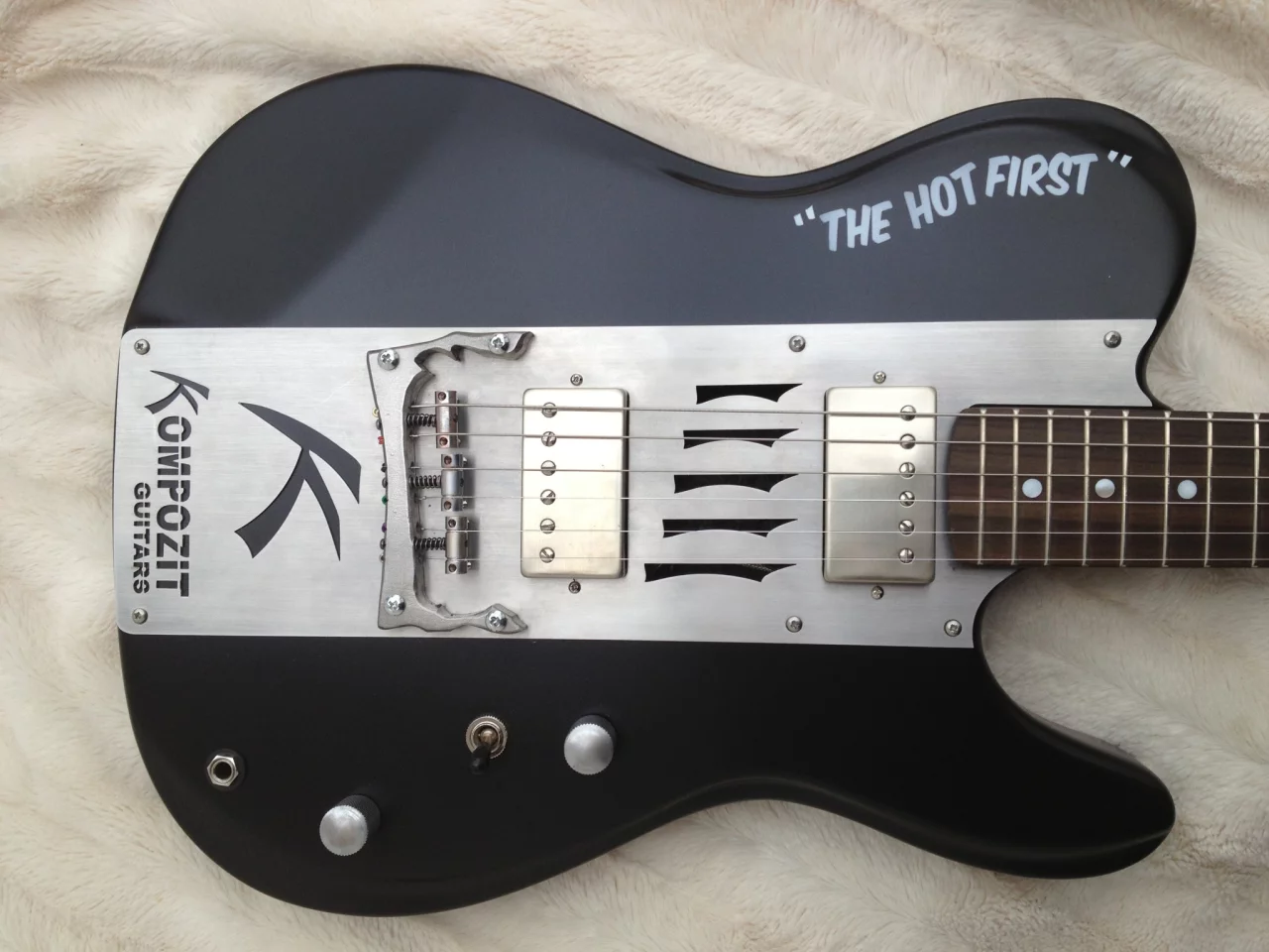 The Hot One guitar with five sound holes positioned between the SP Custom pickups