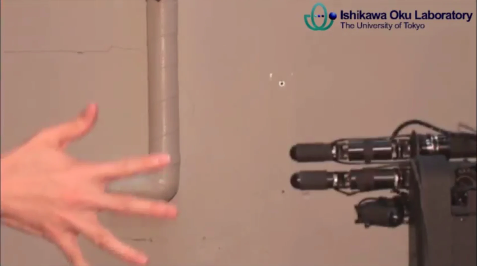 Strictly speaking that should be robot hand and eye, since, as you might have guessed, it uses a high speed vision system that identifies, within a millisecond, the move being made by the human player from the shape of their hand