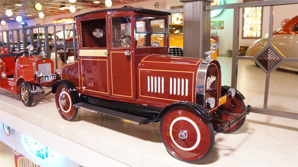 This restored 1924 Cadillac pedal car by Toledo underwent a museum-quality restoration and sold for $21,850 as part of the Pratte Collection.