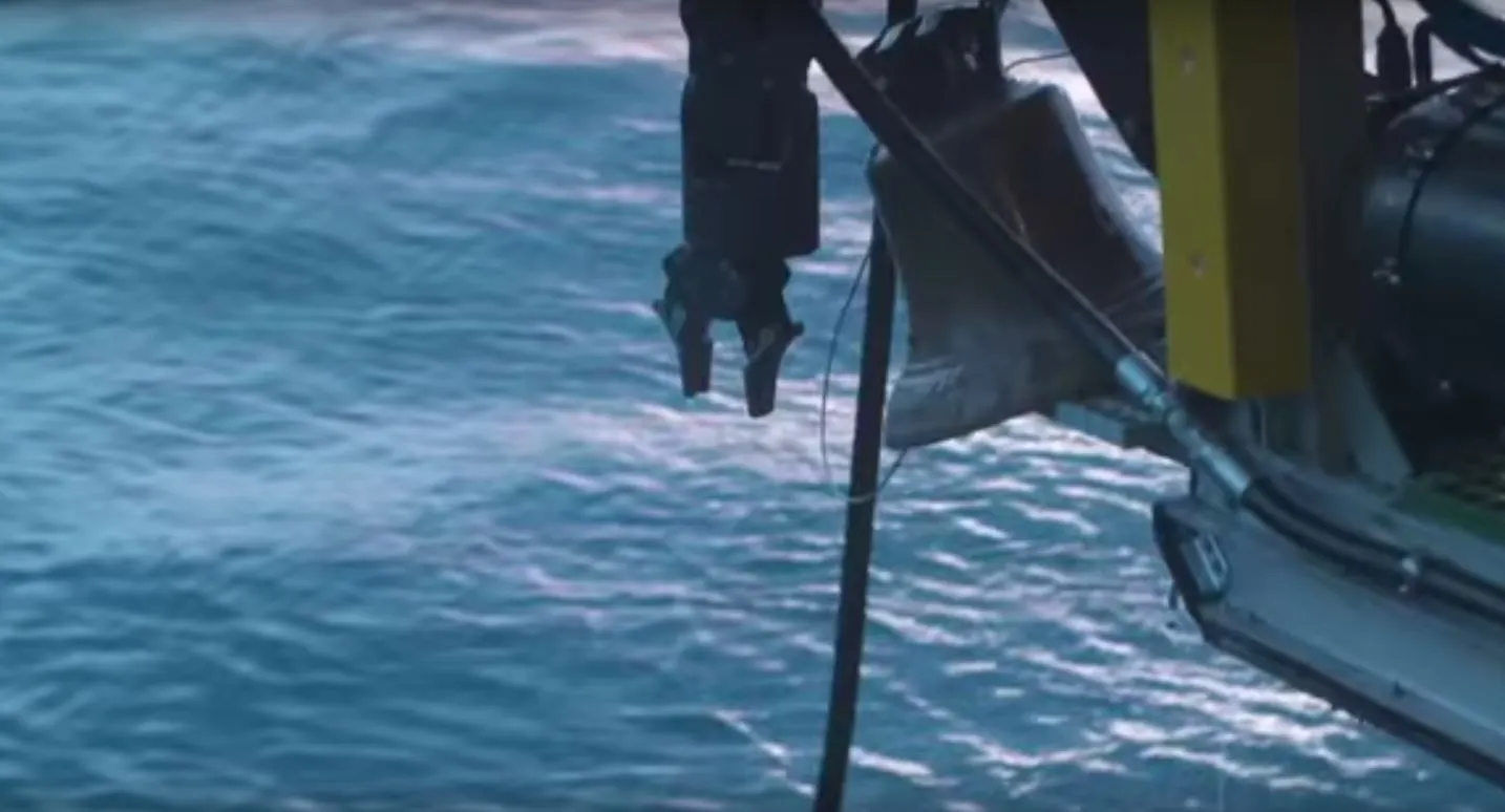 The bell of HMS Hood reaches the surface
