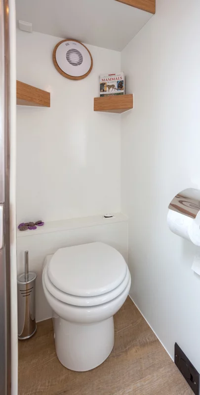 The 15-foot Bliss module includes separate shower and ceramic toilet rooms