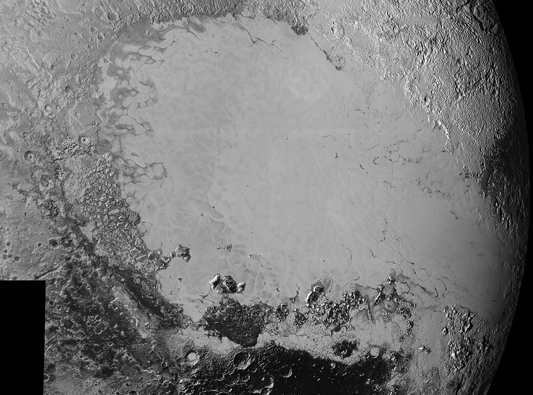 This high resolution mosaic of the icy plain Sputnik Planum and the surrounding area displays a wide array of geological features