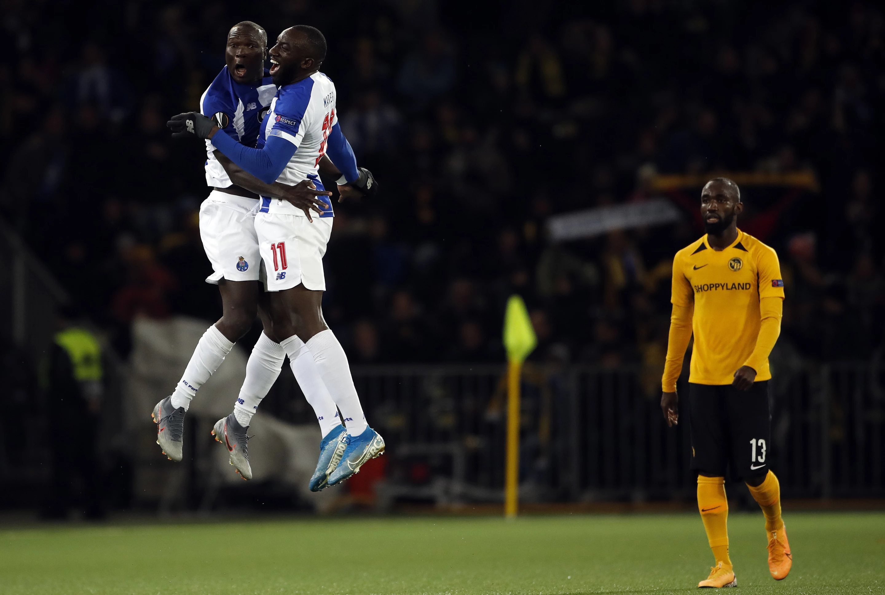 Bronze, Joy. FC Porto's Cameroonian forward Vincent Aboubakar celebrates with team-mate Malian forward Moussa Marega after scoring during a UEFA Europa League match between on November 28, 2019 in Bern