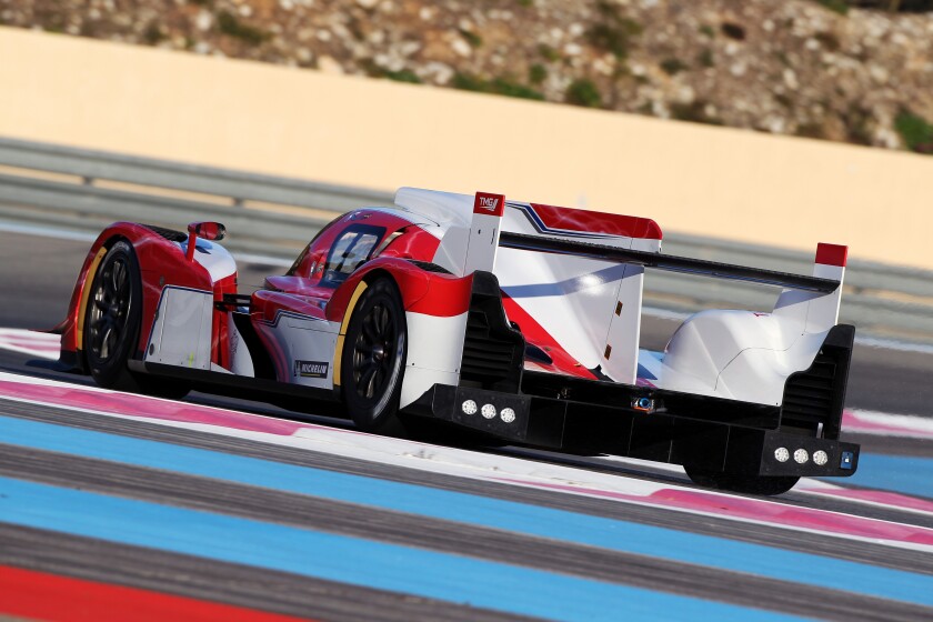 The Toyota TS030 Hybrid sports car on track at the Paul Ricard circuit.