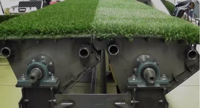 Panels of artificial turf combine to make a full field