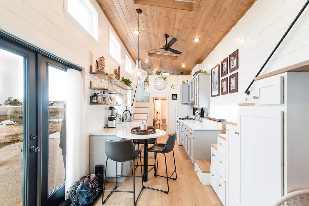Jen's 34' x 10' Tiny Home looks light-filled inside thanks to its generous glazing, which includes four skylights