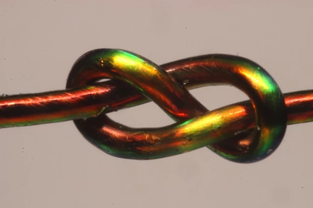 With the help of color-changing fibers, MIT researchers develop a mathematical model to predict a knot’s stability
