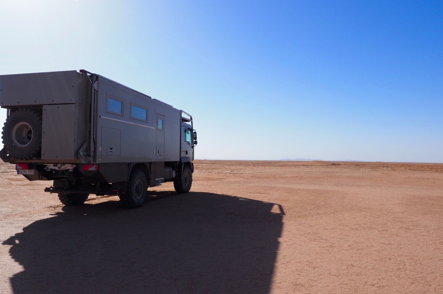 There's no motorcycle lift on back, as seen on the larger MD77h and other expedition vehicles, but the MD57 does have a hydraulic load platform with spare tire and dual storage boxes