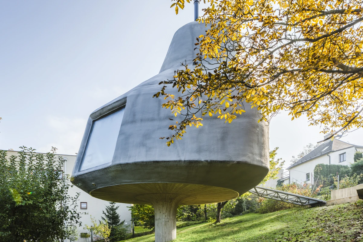 The House in the Orchard sits on a single concrete stilt