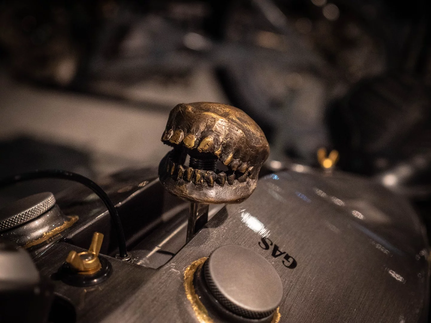 We believe this is Legend's gearshift lever, topped with a set of teeth. We bet there's a story somewhere here, but we're no wiser than you on it.