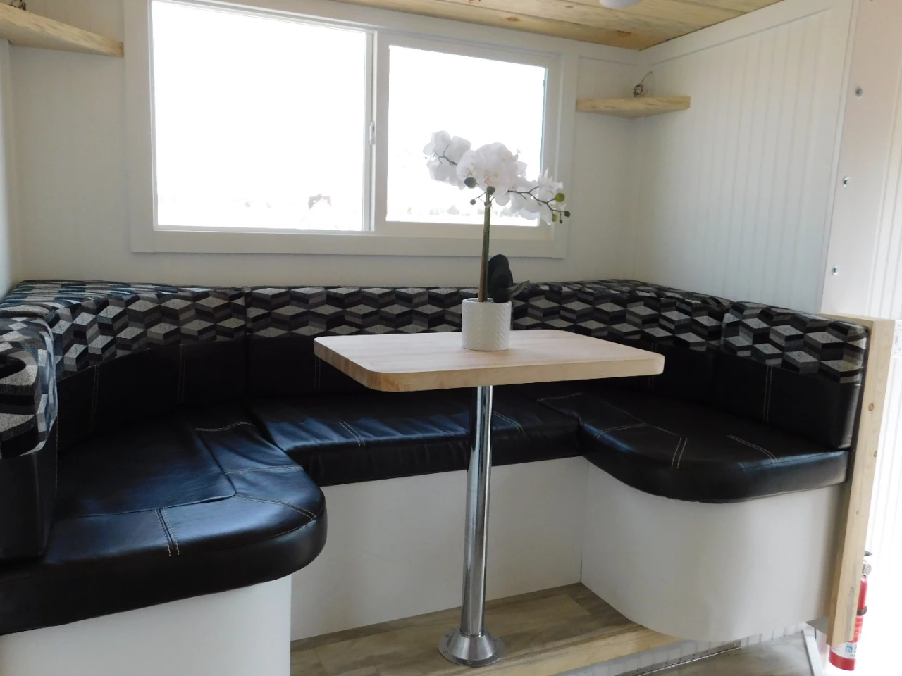 The Ozark's dining/living area shown is located in the slide-out section