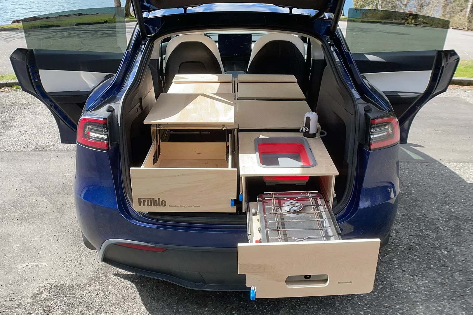 The Complete Tesla Camper Kit, pictured here with a third-party gas cooktop