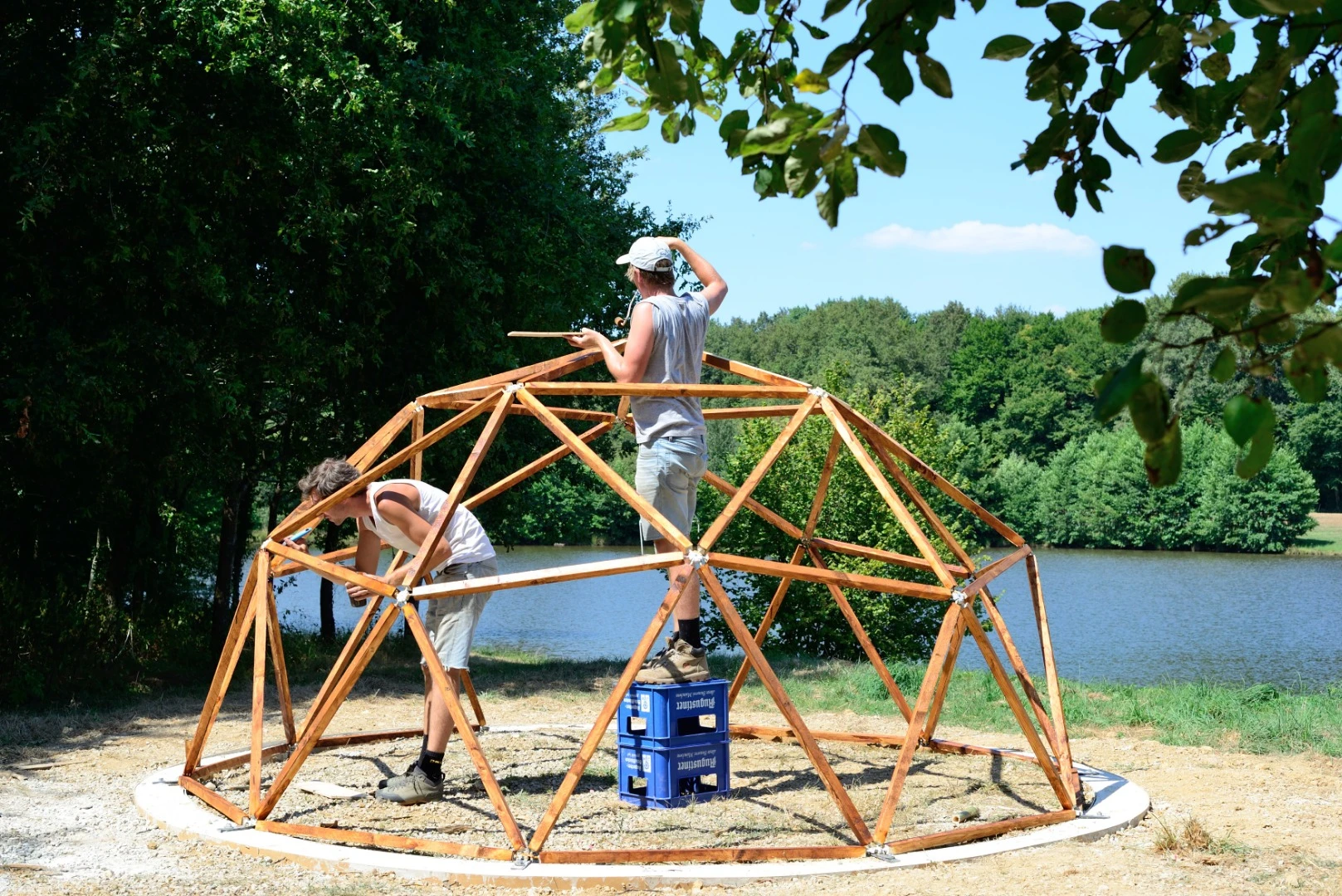Researchers hope to fit drones with spraying hoses to apply layers of biomaterials onto light structures, such as geodesic dome frames or grid shells covered in tensile fabrics