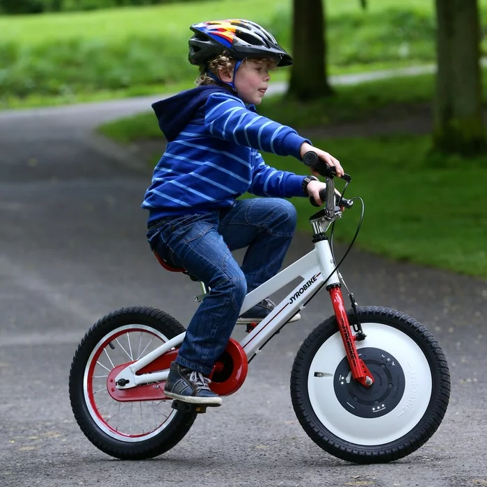 The Gyrowheel replaces the front wheel of the bicycle and features a battery powered spinning disc where you would normally find the spokes